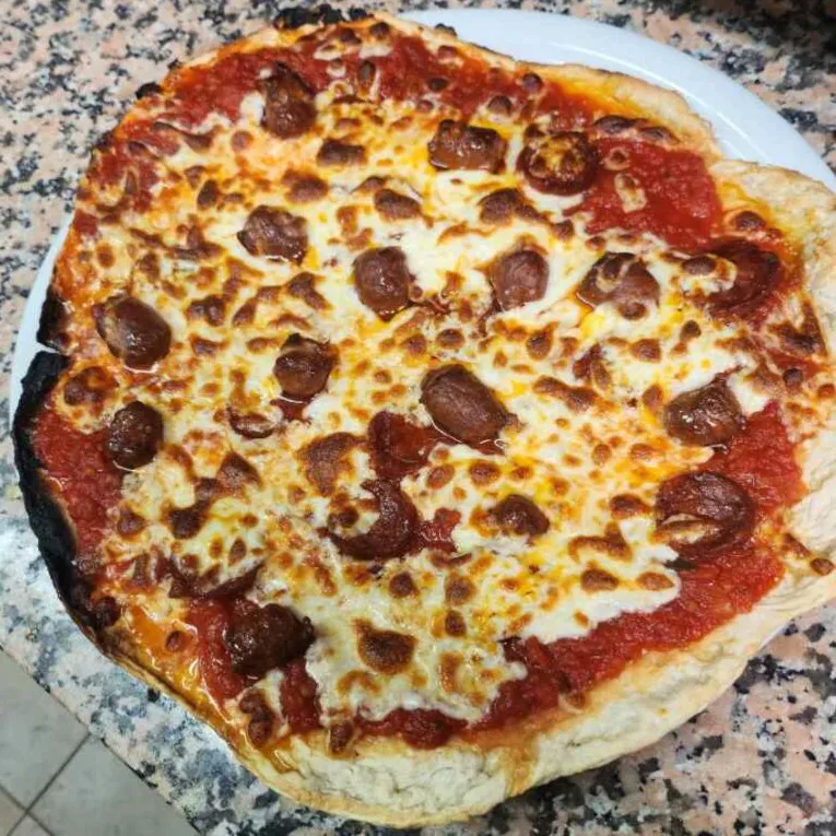 Pizza traditionnelle artisanale la Mexicaine de la Pizzeria La Flambée de Thierry